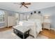 Main bedroom with a king-size bed and plenty of natural light at 4027 Green Forest Ct, Rocky Mount, NC 27804