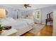 Spacious bedroom with large bed, dresser, and hardwood floors at 4027 Green Forest Ct, Rocky Mount, NC 27804