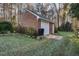 Brick detached garage with single door and small yard at 4027 Green Forest Ct, Rocky Mount, NC 27804