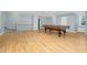 Bright game room with hardwood floors, pool table and upper level view at 4027 Green Forest Ct, Rocky Mount, NC 27804