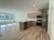 Bright, open kitchen with stainless steel appliances and ample counter space at 424 La Maison Ave # 9, Wendell, NC 27591