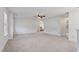 Spacious bonus room featuring neutral carpeting and ceiling fan at 46 Two Belles Ct, Angier, NC 27501