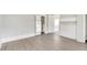 Bright bedroom with hardwood floors and neutral walls at 923 Belvedere St, Rocky Mount, NC 27803