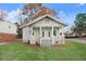 Charming craftsman home with gray siding, front porch, and landscaped lawn at 923 Belvedere St, Rocky Mount, NC 27803