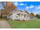 Newly renovated craftsman home with gray siding, front porch, and well maintained lawn at 923 Belvedere St, Rocky Mount, NC 27803