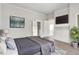 Main bedroom with hardwood floors and modern decor at 923 Belvedere St, Rocky Mount, NC 27803