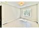 Bright bedroom with neutral walls, carpeted flooring, and a window with natural light at 2625 Silver Gate Ct, Wake Forest, NC 27587