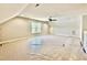 Spacious bonus room featuring neutral walls, ceiling fan, window, and ample lighting at 2625 Silver Gate Ct, Wake Forest, NC 27587