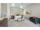 This beautiful bedroom has a blue ceiling, white walls and a light colored chevron area rug at 3410 Bradley Pl, Raleigh, NC 27607