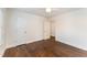 Empty bedroom featuring hardwood floors, and a ceiling fan at 42 Oakwood Dr, Chapel Hill, NC 27517