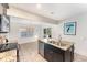 Kitchen with stainless steel appliances, granite countertops and center island with seating, offering a modern look at 42 Oakwood Dr, Chapel Hill, NC 27517