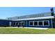 Modern community center with large windows and outdoor patio space at 137 Buckaroo Dr, Louisburg, NC 27549