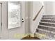 Inviting entryway with stairs and a front door at 137 Buckaroo Dr, Louisburg, NC 27549