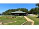 Lakeside gazebo with picnic tables at 137 Buckaroo Dr, Louisburg, NC 27549
