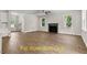 Spacious living room with hardwood floors and a fireplace at 137 Buckaroo Dr, Louisburg, NC 27549