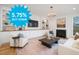 Bright living room featuring built-in shelves, fireplace, and sophisticated decor offers comfort at 1409 Sedgefield St, Durham, NC 27705