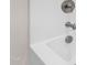 Close up of a modern bathtub with a silver faucet, nozzle, and water drain at 235 Sequoia Dr, Louisburg, NC 27549