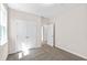 Bedroom featuring neutral carpet, a closet, and natural light from a window at 235 Sequoia Dr, Louisburg, NC 27549