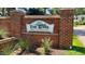 Welcoming brick entrance sign to The River at Lake Royale community at 235 Sequoia Dr, Louisburg, NC 27549