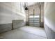 Unfinished garage with concrete floor and cinder block foundation wall at 235 Sequoia Dr, Louisburg, NC 27549