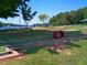 Fun mini golf course with various obstacles and lush green surroundings at 235 Sequoia Dr, Louisburg, NC 27549