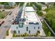 Overhead view of modern townhomes featuring rooftop decks and solar panels in a vibrant neighborhood at 511 S Bloodworth St # 103, Raleigh, NC 27601
