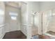 Bright entryway featuring dark hardwood floors and detailed trim work at 7533 Poplar Meadow Ln, Raleigh, NC 27616