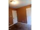 Bright bedroom with closet and carpet flooring at 806 Piper St, Durham, NC 27704