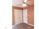 Bedroom with double door closet and ceiling fan at 806 Piper St, Durham, NC 27704