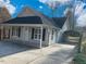 Front view of a charming house with a carport at 806 Piper St, Durham, NC 27704