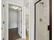 Bathroom showcasing a glass-enclosed shower and access to a walk-in closet and toilet at 8204 Yaxley Hall Dr, Raleigh, NC 27616