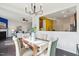 Bright dining area with a view of the living room and kitchen at 8204 Yaxley Hall Dr, Raleigh, NC 27616