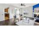 Open-concept living room connecting to kitchen and dining area for seamless entertaining at 8204 Yaxley Hall Dr, Raleigh, NC 27616