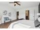 Relaxing main bedroom featuring vaulted ceilings, ensuite bathroom, and cozy seating area at 8204 Yaxley Hall Dr, Raleigh, NC 27616