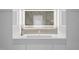 Sleek bathroom vanity with modern fixtures and backlit mirror at 1309 Briar Patch Ln, Raleigh, NC 27615