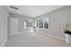 Bright bedroom with large windows, recessed lighting, neutral paint, and plush carpeting at 1309 Briar Patch Ln, Raleigh, NC 27615