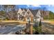 Two-story home with a large backyard and driveway at 145 Wiggins Rd, Louisburg, NC 27549