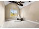 Charming bedroom with vaulted ceiling and large window at 145 Wiggins Rd, Louisburg, NC 27549