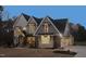 Stunning two-story home with a three-car garage at 145 Wiggins Rd, Louisburg, NC 27549