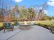 Stone fire pit perfect for outdoor gatherings at 145 Wiggins Rd, Louisburg, NC 27549