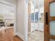 Hallway view with access to laundry and bedroom at 145 Wiggins Rd, Louisburg, NC 27549
