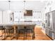 Modern kitchen with large island and breakfast bar at 145 Wiggins Rd, Louisburg, NC 27549