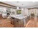 Granite island kitchen with stainless steel appliances at 145 Wiggins Rd, Louisburg, NC 27549