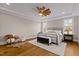 Spacious main bedroom with hardwood floors and large windows at 145 Wiggins Rd, Louisburg, NC 27549