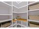 Spacious pantry with ample shelving and storage for kitchen essentials at 145 Wiggins Rd, Louisburg, NC 27549