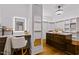Spacious walk-in closet with custom built-ins and vanity at 145 Wiggins Rd, Louisburg, NC 27549