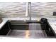 Sleek wet bar sink with modern faucet and filtration system at 145 Wiggins Rd, Louisburg, NC 27549