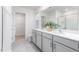 Spacious bathroom featuring a double vanity, modern fixtures, and plenty of storage at 1813 Hinesley Dr, Durham, NC 27703