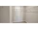 Walk-in closet equipped with shelving, offering efficient and organized storage solutions at 1825 Hinesley Dr, Durham, NC 27703