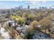 Enjoy mature trees with a view of the cityscape in this neighborhood view at 417 Elm St, Raleigh, NC 27604